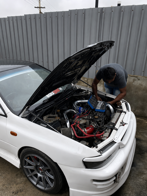 The Autowiz mechanic working on a car engine in Wellington